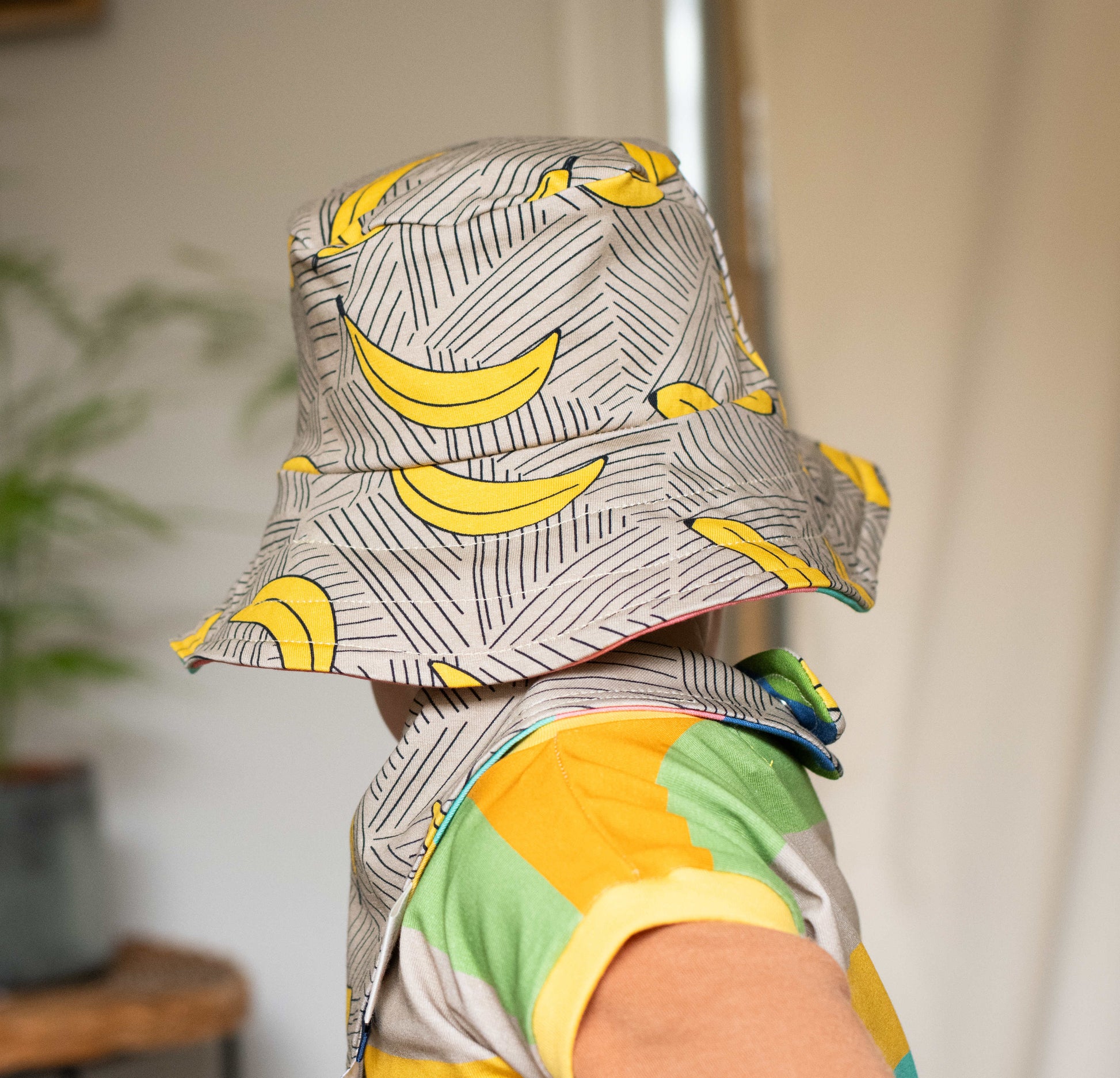 Back of taupe Bananas Reversible Sun Hat