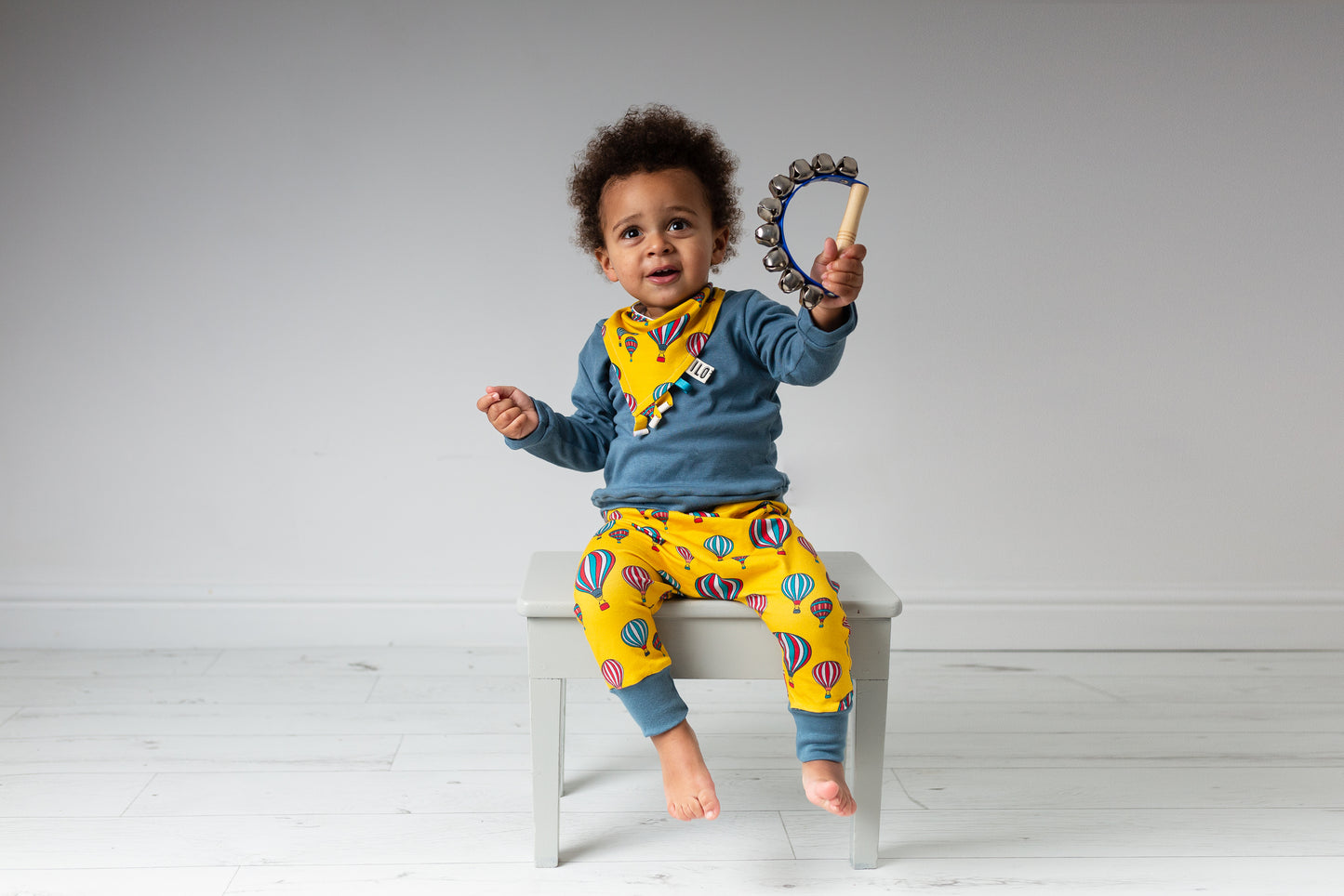 child wearing Organic yellow hot air balloons harem trousers