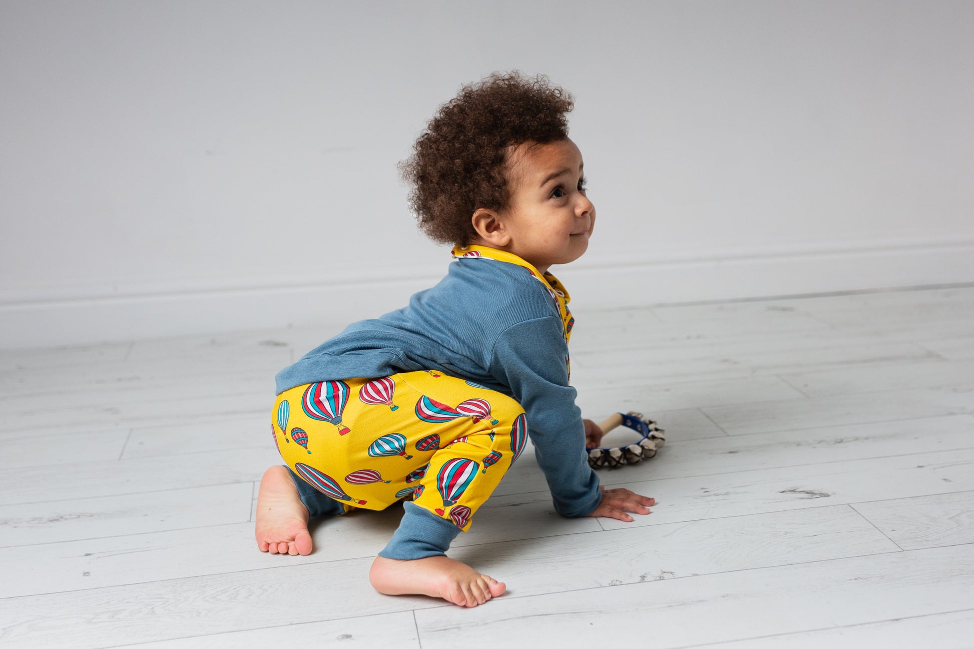 child wearing Organic yellow hot air balloons harem trousers